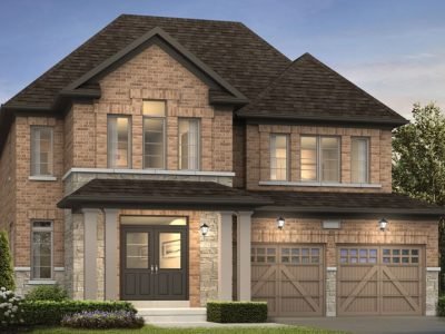 Grand 2-storey detached home with stone columns and modern garage doors
